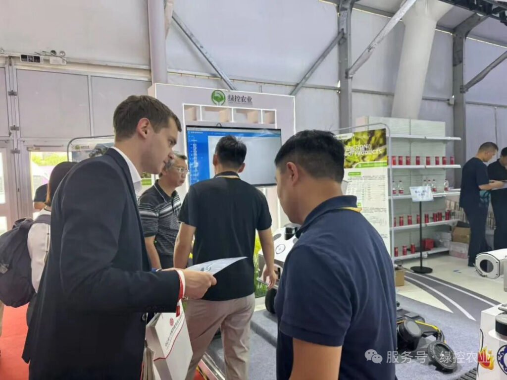 European clients reviewing product catalogs with GC Robotics team at WRC 2025